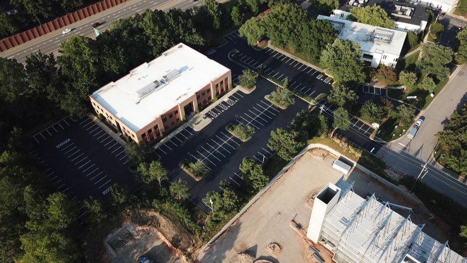Aerial of sealed and striped office lot